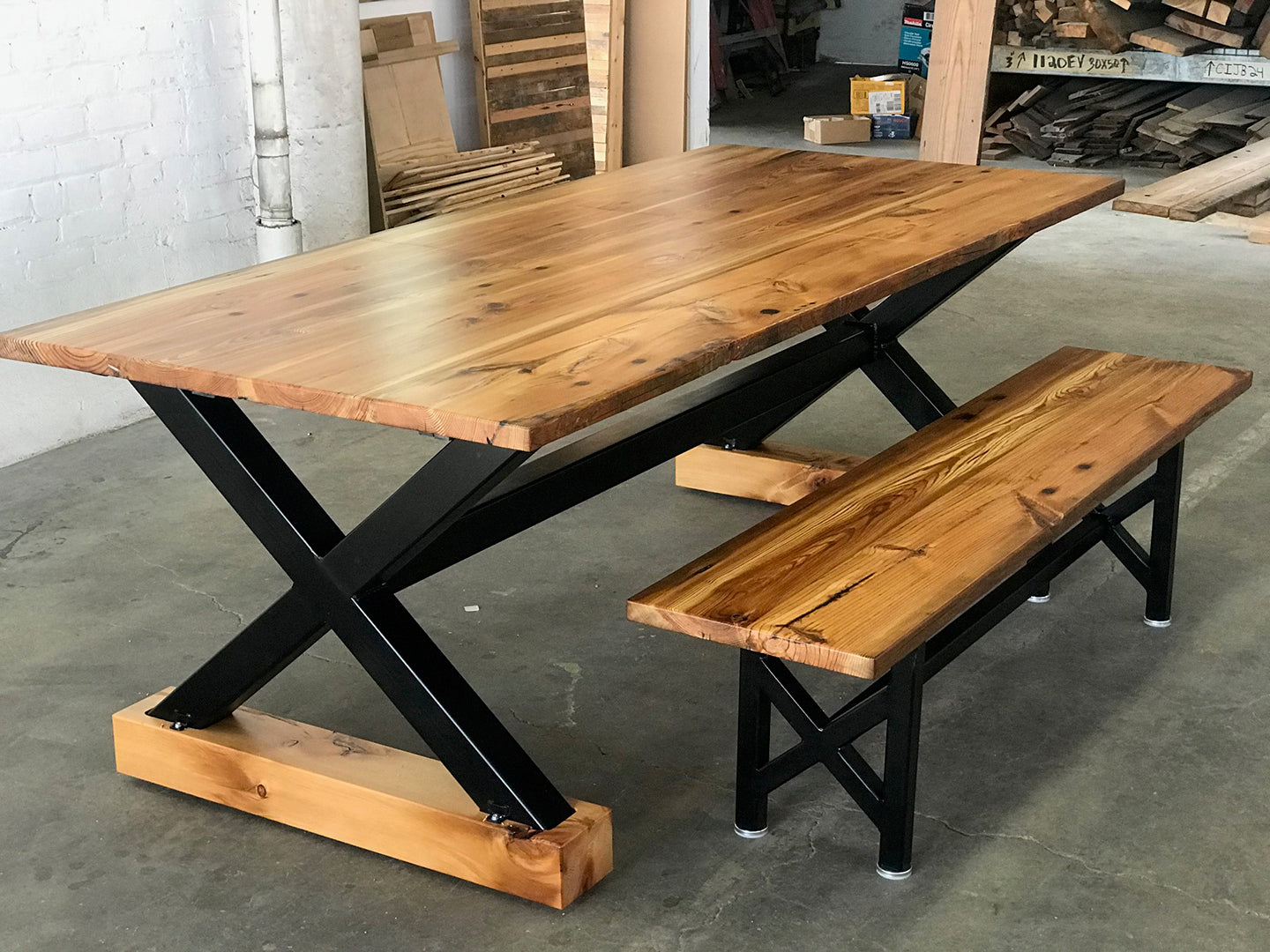 Lafayette Dining Table and Bench Set by Workshop Detroit - Made from reclaimed wood and steel and shown in a natural clear coat finish