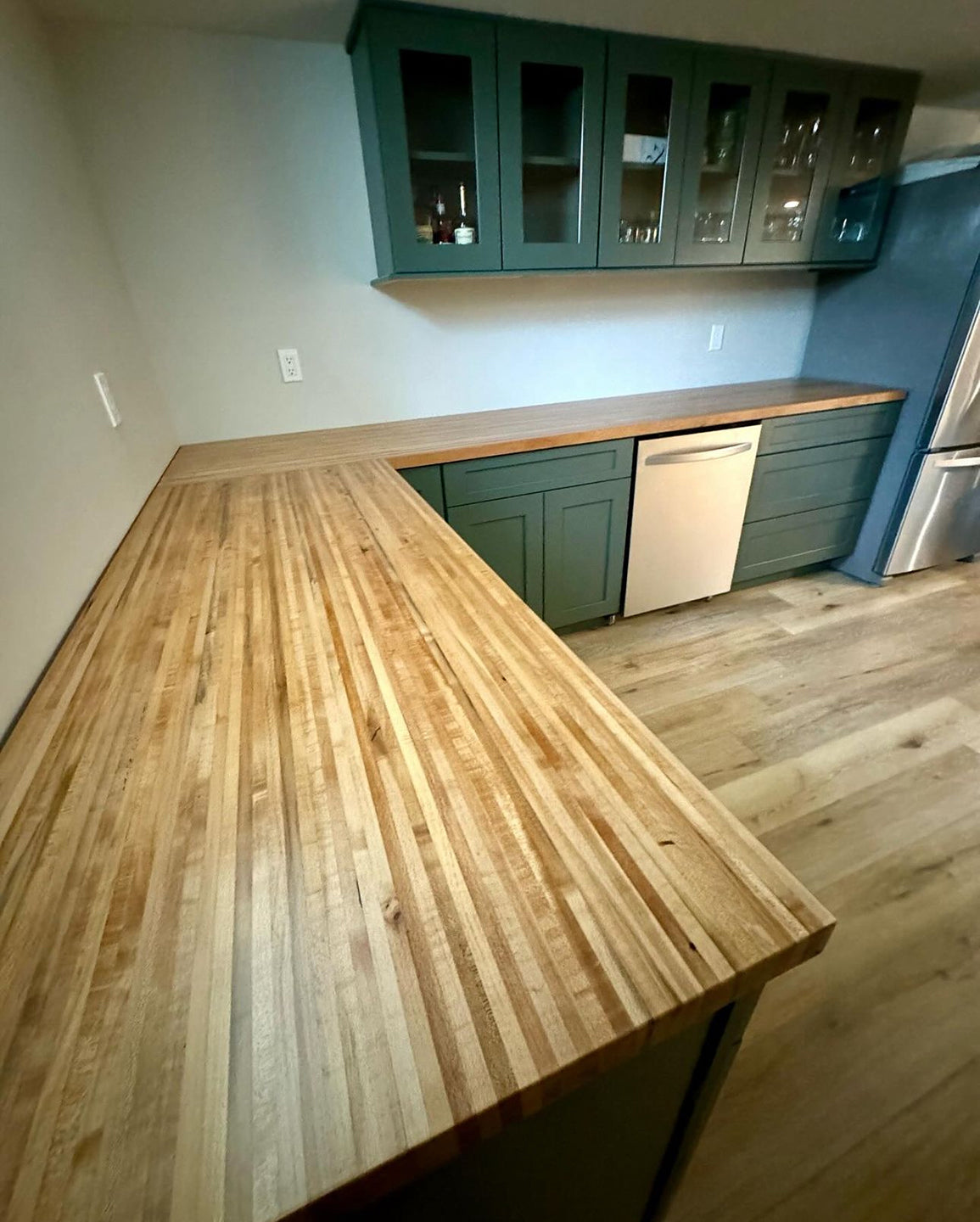 Edge grain utcher block countertop installed in kitchen - Made from reclaimed maple